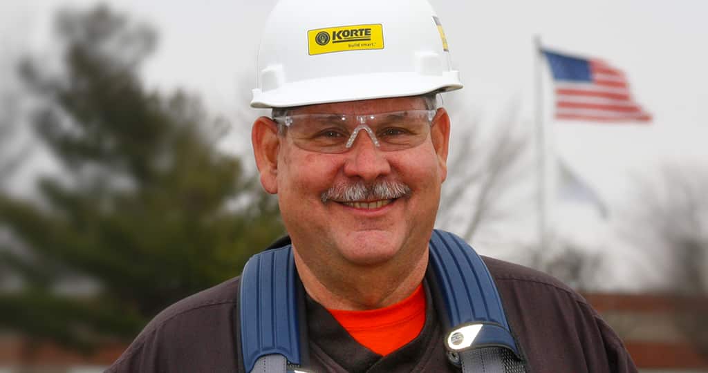 Kevin Moorehead smiling and wearing a hard hat.